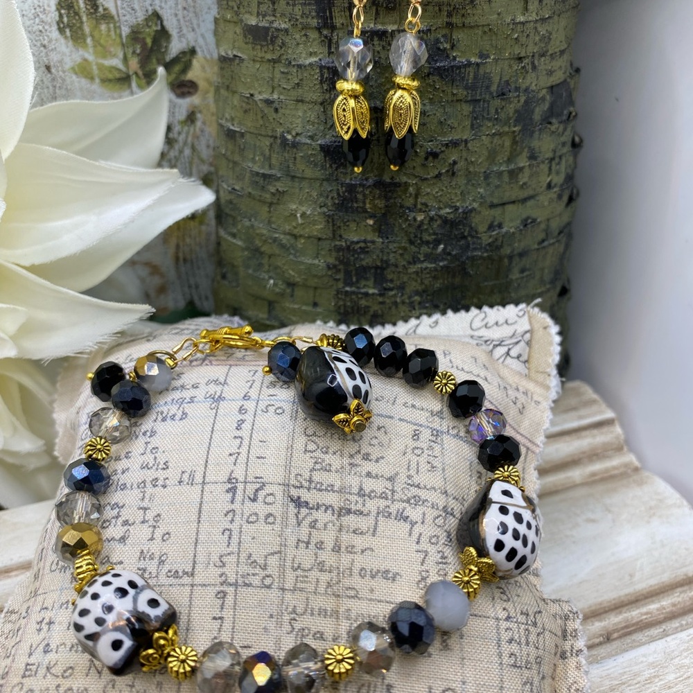 Elegant Black and Gold Owl Bracelet and Earring Set